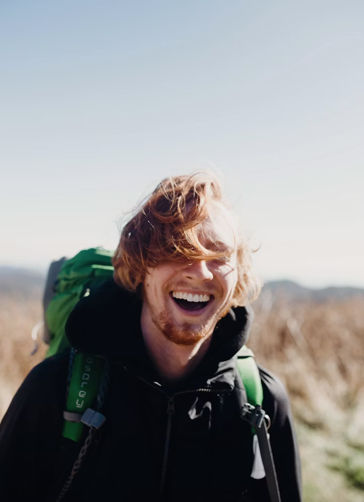 Man hiking outdoors with energy and vitality
